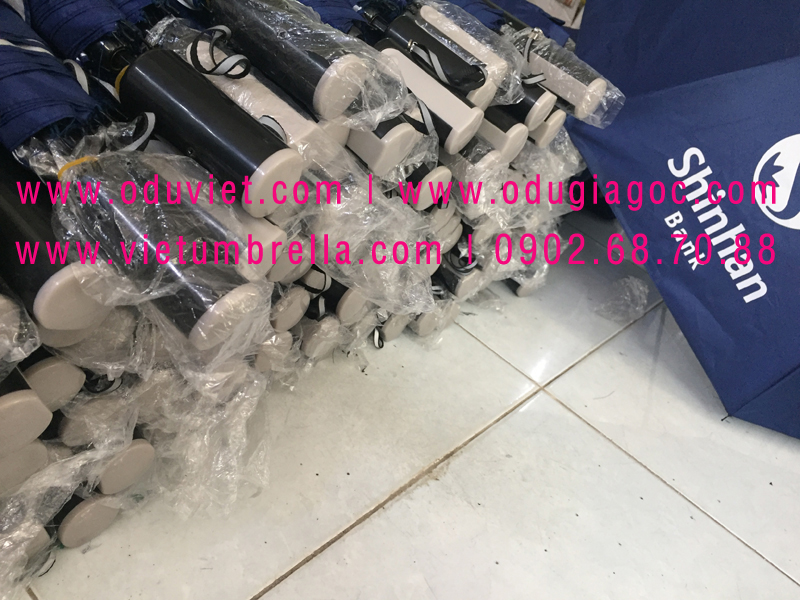 xưởng sản xuất ô dù cầm tay in logo quảng cáo